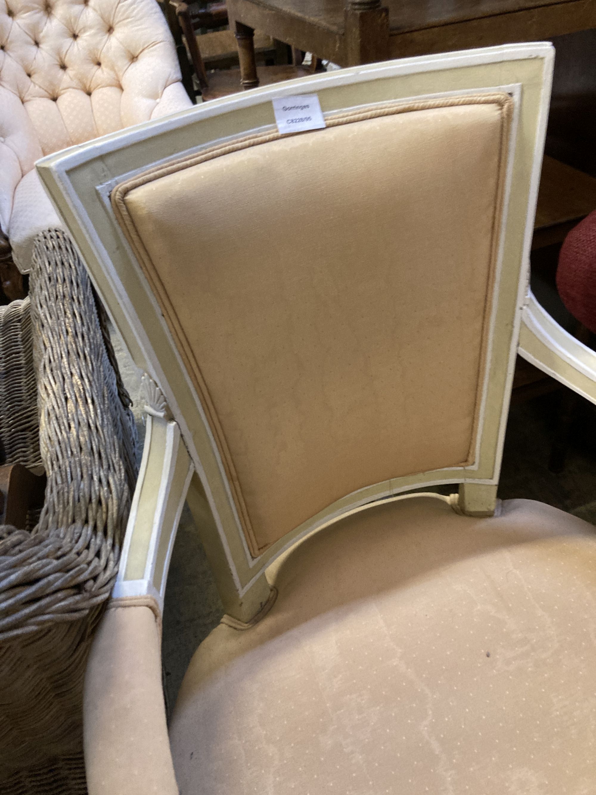 A Louis XVI style cream and white painted fauteuil, width 56cm, depth 48cm, height 88cm